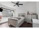 Bedroom with a rustic-style bed and white dresser at 14101 Andrew Scott Rd, Spring Hill, FL 34609