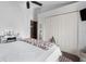 Bright bedroom with a bed, large closet, and window at 14101 Andrew Scott Rd, Spring Hill, FL 34609