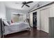 Bright bedroom with double closet and wood floor at 14101 Andrew Scott Rd, Spring Hill, FL 34609