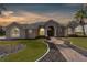 Beautiful two-story home with landscaping and a brick walkway at 14101 Andrew Scott Rd, Spring Hill, FL 34609