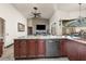 Kitchen with island and view of living area at 14101 Andrew Scott Rd, Spring Hill, FL 34609