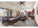 Open living room with a view of the kitchen and access to the pool at 14101 Andrew Scott Rd, Spring Hill, FL 34609