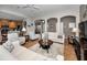 Comfortable living room with a view of the adjacent kitchen and dining area at 1608 Morning Rose Pl, Trinity, FL 34655