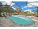 Enjoy this refreshing pool with a spacious screened enclosure at 19771 Tattnall Way, Brooksville, FL 34601