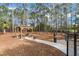 Dog park with pergola and seating at 2695 Royal Ridge Dr, Spring Hill, FL 34606