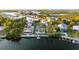 Aerial view of the property and surrounding waterfront community at 3464 Minnow Creek Dr, Hernando Beach, FL 34607