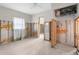 Bedroom under renovation, showing framing and new flooring at 3464 Minnow Creek Dr, Hernando Beach, FL 34607