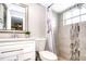 Updated bathroom with a shower/tub combo and modern vanity at 4209 Prince Pl # A, New Port Richey, FL 34652