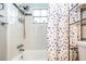 Updated bathroom with a tub shower and white subway tile at 4209 Prince Pl # A, New Port Richey, FL 34652
