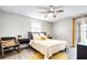 Bright bedroom with queen-size bed and access to a private bathroom at 4209 Prince Pl # A, New Port Richey, FL 34652