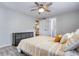 Spacious bedroom with a queen bed and built-in storage at 4209 Prince Pl # A, New Port Richey, FL 34652
