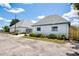 Simple community building with gated entrance and landscaping at 4209 Prince Pl # A, New Port Richey, FL 34652