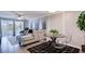 Modern dining area with a small table and see-through kitchen at 4209 Prince Pl # A, New Port Richey, FL 34652
