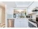 Modern kitchen features stainless steel appliances and an open concept design at 4209 Prince Pl # A, New Port Richey, FL 34652