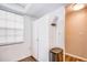 Bright laundry area with white cabinets and a window at 4209 Prince Pl # A, New Port Richey, FL 34652
