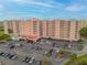 Aerial view of building with parking and waterfront at 4516 Seagull Dr # 413, New Port Richey, FL 34652