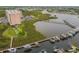 Aerial view showing building and marina, with boardwalk and boats at 4516 Seagull Dr # 413, New Port Richey, FL 34652