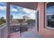 Enjoy the view from this balcony with table and chair set at 4516 Seagull Dr # 413, New Port Richey, FL 34652