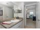 Bathroom with a single vanity and view of the office at 4516 Seagull Dr # 413, New Port Richey, FL 34652