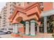 Elegant condo entrance with columns and a covered walkway at 4516 Seagull Dr # 413, New Port Richey, FL 34652