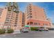 Condo building with parking and landscaping at 4516 Seagull Dr # 413, New Port Richey, FL 34652