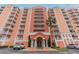 Condo building with parking and entrance at 4516 Seagull Dr # 413, New Port Richey, FL 34652