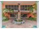 A lovely dolphin fountain in the courtyard of a condo building at 4516 Seagull Dr # 413, New Port Richey, FL 34652
