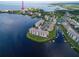 Aerial view of waterfront condo community with pool and boat slips at 4550 Bay Blvd # 1237, Port Richey, FL 34668