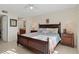 King-size bed, ensuite bathroom access, and neutral decor at 4550 Bay Blvd # 1237, Port Richey, FL 34668