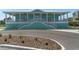 Community clubhouse with spacious front porch at 4550 Bay Blvd # 1237, Port Richey, FL 34668