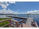 Private dock extending over calm water at 4550 Bay Blvd # 1237, Port Richey, FL 34668