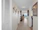 Condo entry hallway with tile flooring and view to living area at 4550 Bay Blvd # 1237, Port Richey, FL 34668