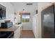 Kitchen with granite countertops and white cabinets, offering a workspace at 4550 Bay Blvd # 1237, Port Richey, FL 34668