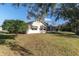 House exterior showcasing a well-maintained lawn and landscaping at 4635 Bellemede Blvd, New Port Richey, FL 34655