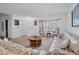 Bright living room with bay window and comfy seating area at 4635 Bellemede Blvd, New Port Richey, FL 34655