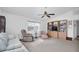 Spacious living room featuring ample seating and built-in shelving at 4635 Bellemede Blvd, New Port Richey, FL 34655