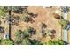 Overhead view of property highlighting large lot and surrounding trees at 5085 Bone Ln, Brooksville, FL 34604