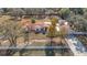 Single-story house with a large backyard and driveway at 5085 Bone Ln, Brooksville, FL 34604
