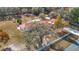 House with a large yard, and a long driveway at 5085 Bone Ln, Brooksville, FL 34604