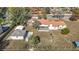 Aerial view showcasing house, detached garage, and expansive lot at 5085 Bone Ln, Brooksville, FL 34604