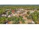 Aerial view of property with a large lot and trees at 5085 Bone Ln, Brooksville, FL 34604
