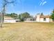 Spacious backyard with detached shed and screened enclosure at 5085 Bone Ln, Brooksville, FL 34604