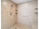Large walk-in shower with tiled walls and built in seat at 5085 Bone Ln, Brooksville, FL 34604