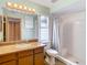 Bathroom with shower and granite vanity at 5085 Bone Ln, Brooksville, FL 34604