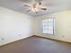 Bedroom with ceiling fan and window at 5085 Bone Ln, Brooksville, FL 34604