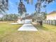 Metal carport provides covered parking at 5085 Bone Ln, Brooksville, FL 34604