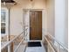 Brown front door with ramp access at 5085 Bone Ln, Brooksville, FL 34604