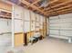 Partially finished garage with overhead storage at 5085 Bone Ln, Brooksville, FL 34604