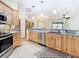 Updated kitchen, featuring granite countertops and stainless steel appliances at 5085 Bone Ln, Brooksville, FL 34604