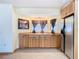 Kitchen boasts granite countertops, wood cabinets, and a corner window at 5085 Bone Ln, Brooksville, FL 34604
